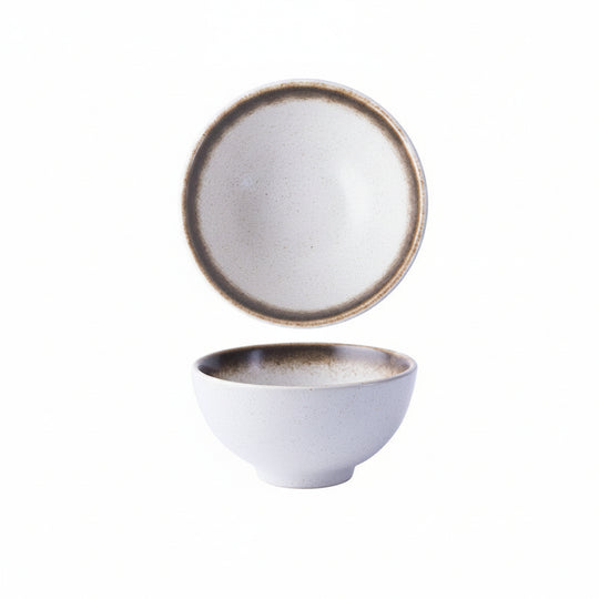 Small ceramic catch bowl in daytime glaze, warm light tenmoku finish